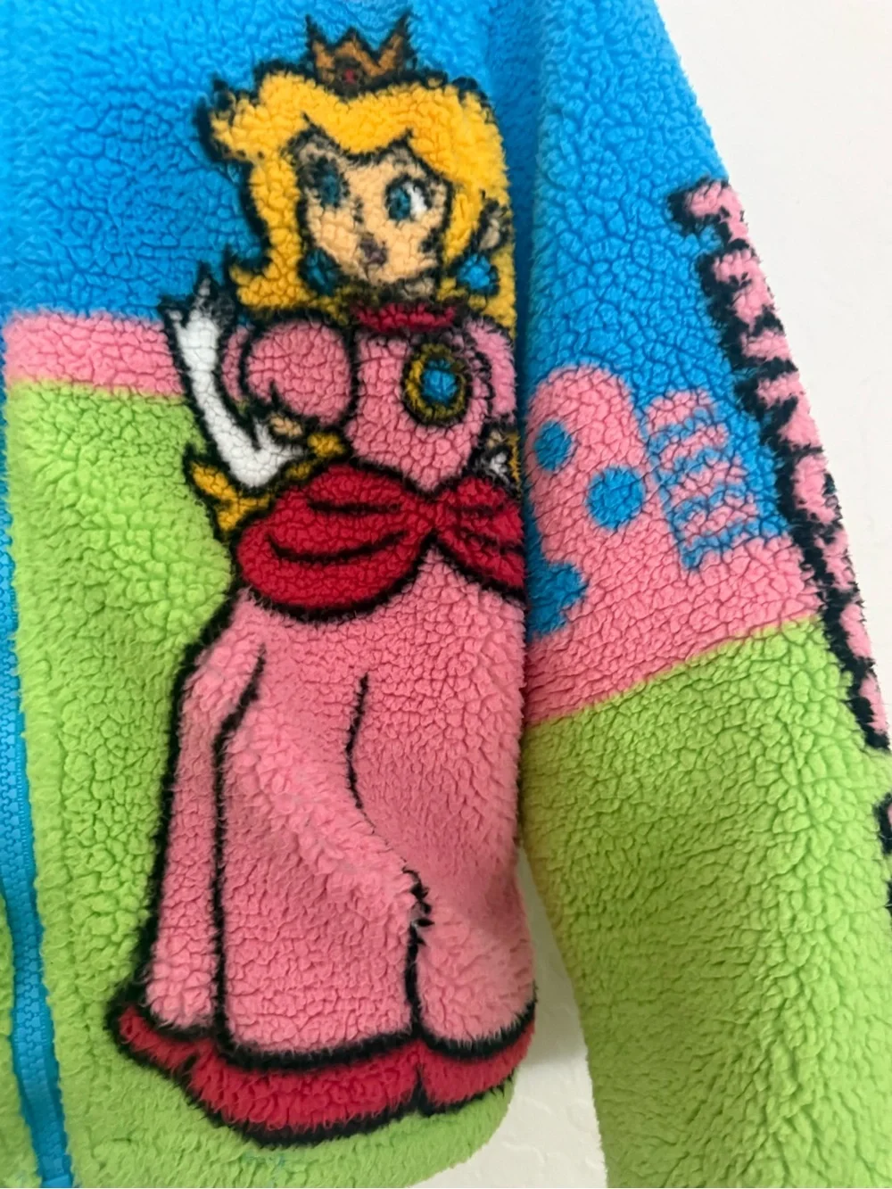 Blue & Green Fuzzy Zip Hoodie with Pink Character Graphic